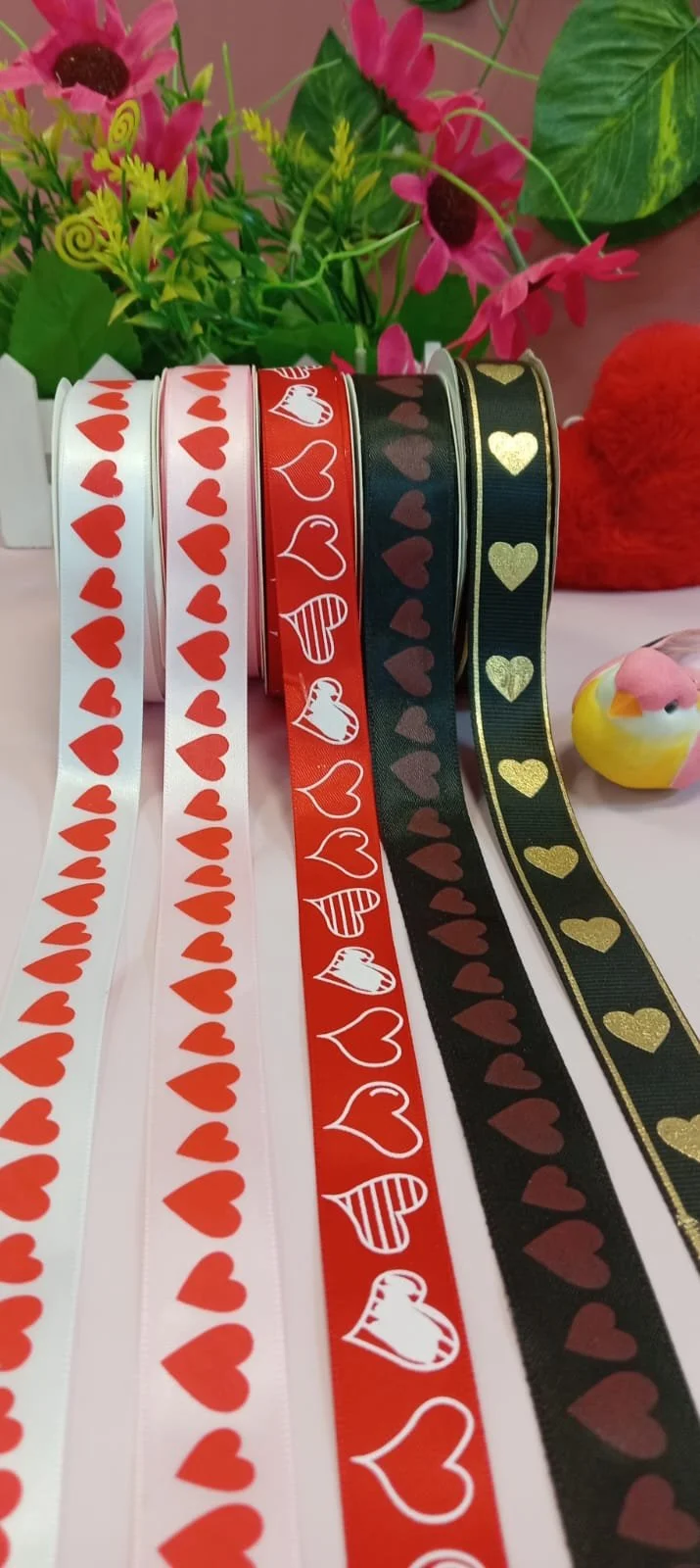 Love ribbons: white, pink, red, and black ribbons with heart patterns
